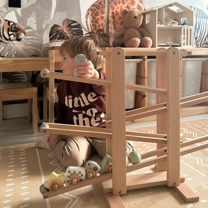 Suur puust ummiktee - liumägi pöörlevate elementidega