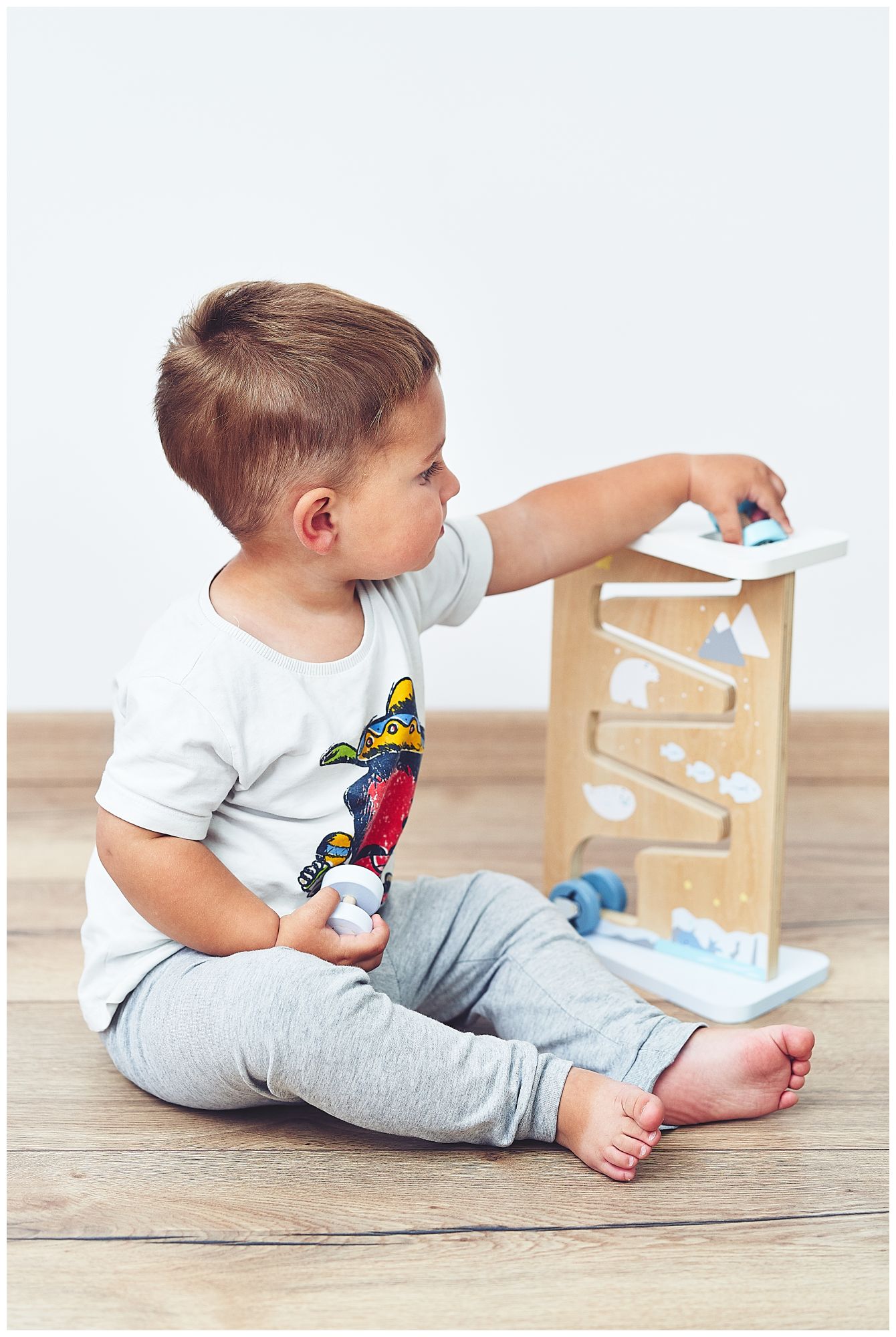 Puidust kahepoolne sensoorne manipulatsioonilaud